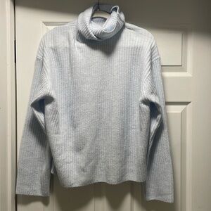 Light blue turtle neck sweater from H&M. NWT.